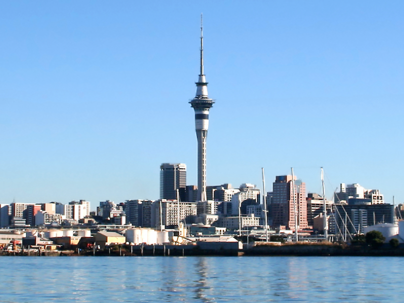 Auckland City and Skytower viewed across the Waitemata Harbour on a bright clear sunny morning