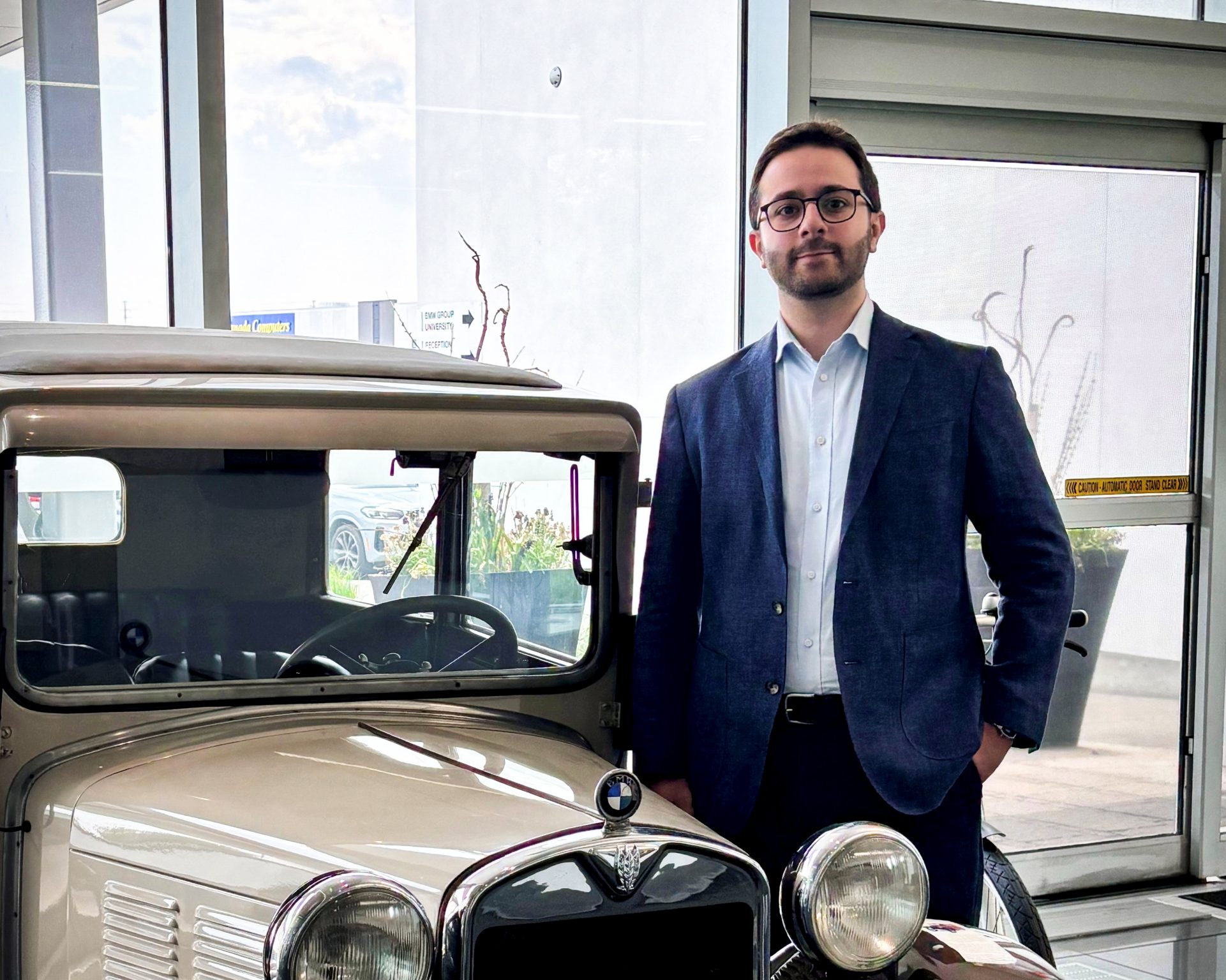 The image shows Mounir, Senior Specialist, Sales Strategy, BMW Group Canada