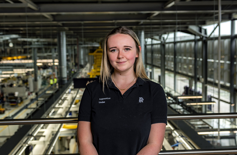 Leather apprentice Jade carefully working at BMW