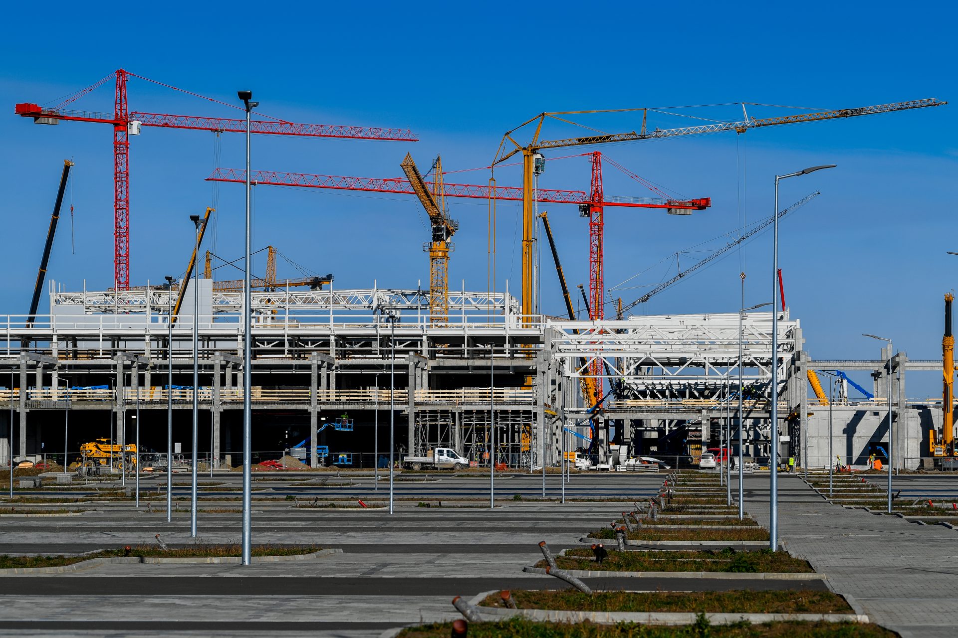 The image shows an aerial view of the BMW plant Debrecen construction site.